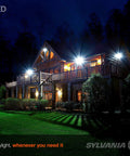 250W Equivalent LED PAR38 Flood Light Bulb 23W, 2 Pack, illuminating house exterior at night, showcasing brightness and coverage.