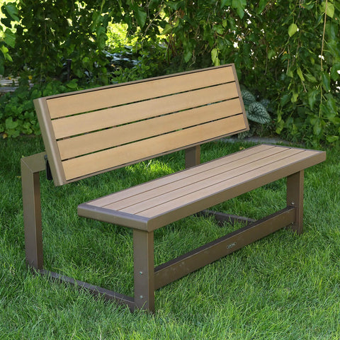 Convertible Bench To Table In Seconds Outdoor Furniture With Faux Wood Look No Fuss One Person Setup in bench form on grass.