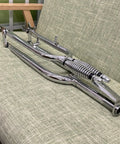 Chrome 26 Inch Springer Fork For Cruiser Bicycles With Dual Spring Suspension on a green cushion
