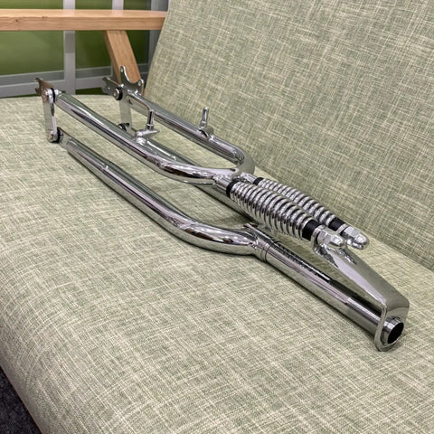 Chrome 26 Inch Springer Fork For Cruiser Bicycles With Dual Spring Suspension on a green cushion