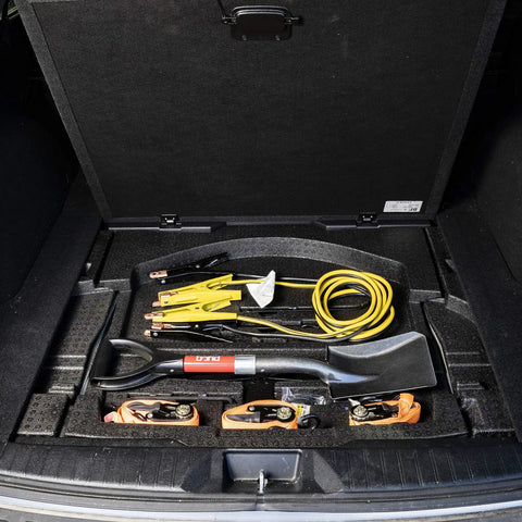 Compact Mini D Handle Square Head Shovel With Soft Grip, stored in car trunk with jumper cables, red and black finish.