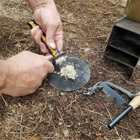 Hands using FireRope Tinder Weatherproof Firestarter For Camping And Survival Quick Ignition With Lighter Or Matches