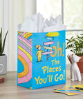 13 Inch Large Dr. Seuss Graduation Gift Bag With Tissue Paper And Card Oh The Places You'll Go For High School College Kindergarten Nursing School Grads on table