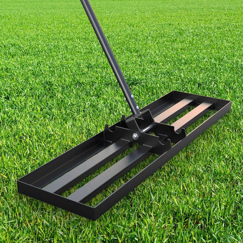 Heavy Duty Lawn Leveling Rake With 36 Inch Head And 7.2 Ft Handle Ground Plate Leveler shown on grass