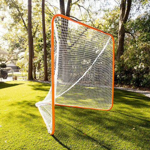Official 6x6 Lacrosse Goal With Quikset Net Attachment for Quick Setup shown in backyard, sturdy steel frame, durable net.