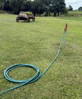Heavy Duty Flexogen Three Quarters Inch By Fifty Foot Garden Hose With Eight Layer Construction And Five Hundred Psi Burst Strength coiled on grass