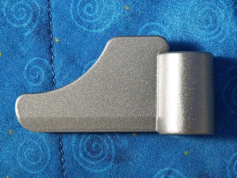 Metal paddle from 8-BBP-P070 Paddle Blade Replacement Pack Of 2 For BB-PAC20 Bread Machine on blue background.