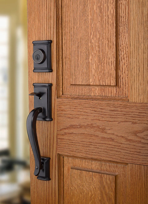 Ashfield Front Door Lock Set With Deadbolt And Exterior Handleset in Venetian Bronze on wooden door