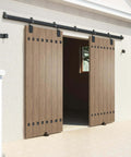 20 Foot Heavy Duty Box Rail Exterior Sliding Barn Door Hardware Kit With 450 Lbs Capacity Black Powder Coat Finish installed outdoors