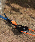 Off Road Winch Rope Extension For ATV UTV Three Eighth Inch Synthetic Cable Eighty Four Feet Orange Abrasion Resistant With Protective Sleeve and PVC Sheath Easy To Use Recovery Line For Tough Trails attached to tree with pulley system