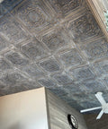 Drop In 2x2 Ceiling Tiles Pack Of 10 PVC Panels With Antique Gold Faux Tin Look installed on a ceiling, adding vintage vibe.