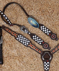 Top Shelf Western Leather Headstall And Breast Collar Tack Set With Lucky Dice Tooling Antique Copper Hardware And Checkyard Patterns Built For Any Arena Run on hay background.