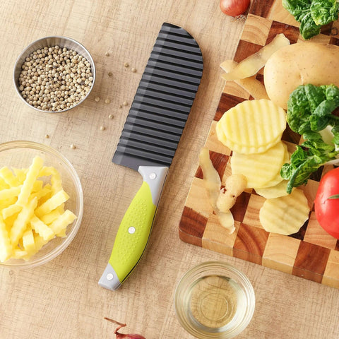 VRUIFA French Fry Cutter with lime-green handle and ridged black blade on wooden board