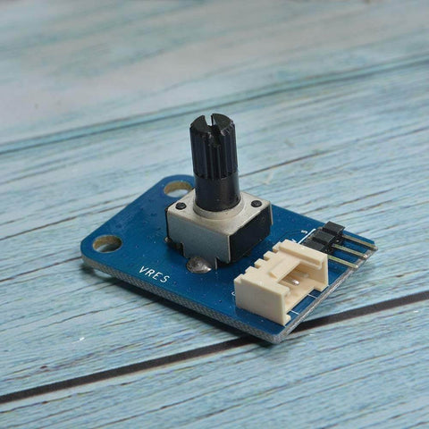 Close-up of 10K Ohm rotary potentiometer module for Arduino with 3 pin and Grove 4 pin interface on blue circuit board.