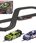 Darlington Showdown Slot Car Track Set With Two NASCAR Themed Cars And Dual Speed Controllers Analog Racing Action For Ages Eight Plus One To Thirty Two Scale Track Play For Family And Friends displayed with track and components.