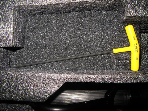 Yellow hex wrench tool for adjusting Pilot AA Camera Stabilization System with Sled, Vest, Arm, Backpack Transport.