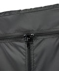 Close-up of Weather-X Garage Shelf Cover for 48x18x72 Inch Shelving Units with Weather Resistant Backing and Full Zipper Access.