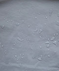 Water droplets on weather resistant vinyl cover showcasing its protective features for 2000 to 4000 watt inverter generators.