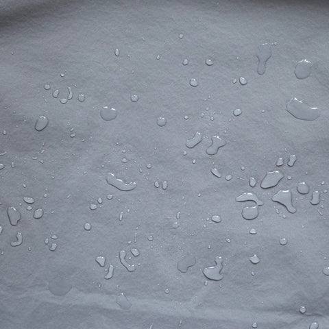 Water droplets on weather resistant vinyl cover showcasing its protective features for 2000 to 4000 watt inverter generators.