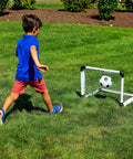 Child playing with Mini Soccer Goal Set For Kids Kid Friendly Easy Backyard And Indoor Play With Portable Net Ball And Pump