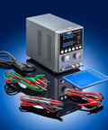 30V 5A Bench DC Power Supply Kit with USB Output, precision probes, banana leads, and magnetic work mat displayed on blue background.