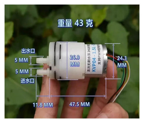 Micro Brushless DC Water Pump With Diaphragm Dosing System shown with dimensions, 2418 motor, 6V-12V range, held in hand.