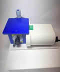 Chem Flow Diaphragm Metering Pump For Chemical Dosing, 7 GPD Max, 100 PSI, 115 Volt, 3/8 Inch Tubing Connections, top view