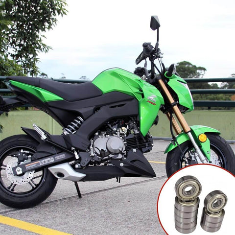 Green motorcycle with inset image of Ten Pack 6201 1/2 ZZ Ball Bearings Sealed Chrome Steel Pre Lubricated 12.7 By 32 By 10 Mm.