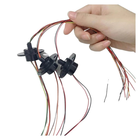 Hand holding Go To Compact 22mm Flange Slip Ring with 2A current rating, conductive ring brush, multiple colored wires visible