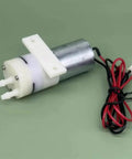 Tiny DC 6V To 12V Micro Water Pump Delivers 500mL Per Minute Diaphragm Self Priming Pump For DIY, side view with wires