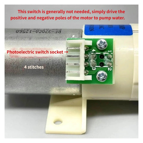 Close-up of a component with photoelectric switch socket and labels on a cordless 12V diaphragm water pump with 8mm orifice metering flow