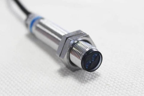 Diffuse Reflection Photoelectric Switch Sensor E3F1DS5C4 NPN NO 18mm Diameter, 5cm Sensing Range Transducer, close-up view.