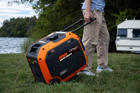 Person transporting 6800-Watt Dual Fuel RV-Ready Inverter Generator With Electric Start, Portable Backup for RVs and EVs, on grass