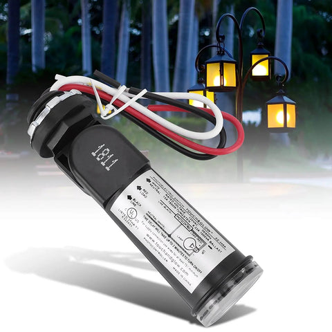 Dusk To Dawn Photoelectric Switch With Light Sensor for Outdoor Lighting, shown against a lit garden lantern backdrop at dusk.
