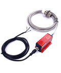 Non Contact Eddy Current Displacement Sensor 4-20mA Signal, Stainless Steel Body, coiled cable and red transducer for precise measurement.