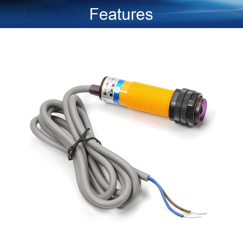 Close-up of Go-To Through-Beam Photoelectric Sensor Switch Kit E3F-5L+E3F-5DN1 with cables, black and orange, for industrial automation.