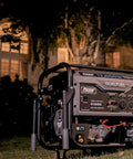 Heavy Duty Portable Dual Fuel Generator with Electric Start Delivers 12,000 Peak Watts and 9,500 Rated Watts on Gas, night scene
