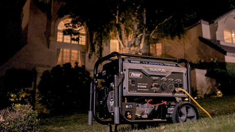 Heavy Duty Portable Dual Fuel Generator with Electric Start Delivers 12,000 Peak Watts and 9,500 Rated Watts on Gas, night scene