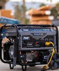 Heavy Duty Portable Dual Fuel Generator With Electric Start Delivers 12,000 Peak Watts And 9,500 Rated Watts On Gas in outdoor setting