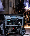 Heavy Duty Portable Dual Fuel Generator With Electric Start Delivers 12,000 Peak Watts And 9,500 Rated Watts On Gas in a workshop
