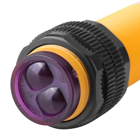 Close-up of Infrared Photoelectric Sensor Switch, 3 Wire PNP, 6-36V DC Compatible, showing front lens and connector for automation use