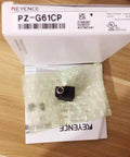 Keyence Photoelectric Sensor PZG61CP in packaging with product box on wooden surface