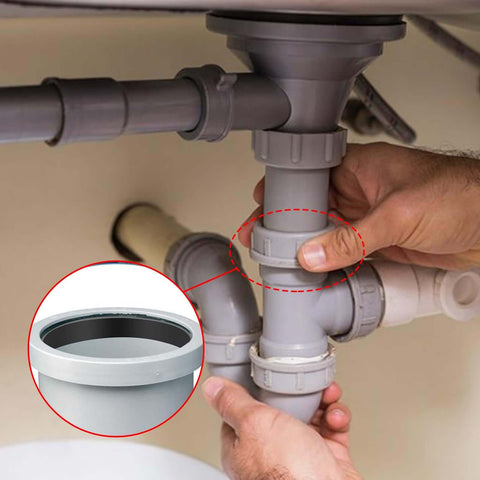 Hands installing 20 Piece Kitchen Sink Drain Gasket Seal Ring Set for 1.2 to 1.4 Inch Slip Joint Washers under a kitchen sink.