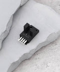 Side view of Two Pack Micro Photoelectric Sensor Switch 5 To 24V DC NPN Output Selectable Normally Open Or Normally Closed on stone