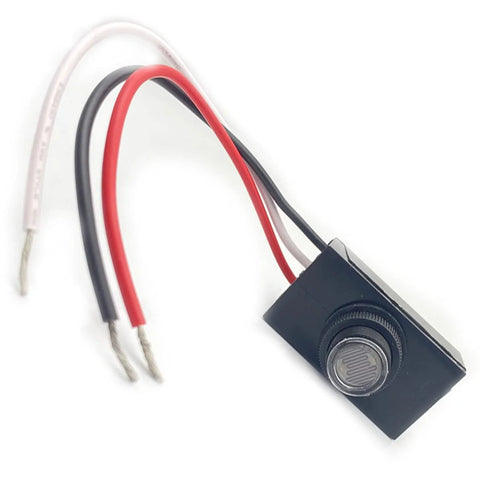 Outdoor 120V AC Dusk To Dawn Photocell Switch with wires for exterior post lights, front view showing light control sensor.