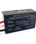 Outdoor 120V AC Dusk To Dawn Photocell Switch with light control sensor, hard wired UL certified, black rectangular design.