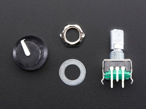 Rotary Encoder With Extras ADA377 components including knob and mounting hardware for electronic projects on black background.