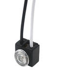 Close-up of Plug And Play No Fuss Easy Install Dusk Till Dawn Photocell Switch for 120V Lighting with two wires and transparent lens