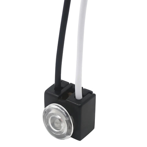 Close-up of Plug And Play No Fuss Easy Install Dusk Till Dawn Photocell Switch for 120V Lighting with two wires and transparent lens