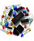 Assorted electronic components including resistors, capacitors, and IC chips for industrial vacuum systems.